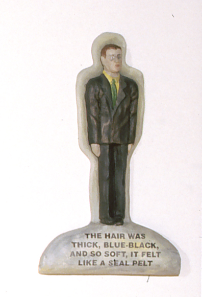 The hair was thick, blue-black and soft, it felt like a seal pelt