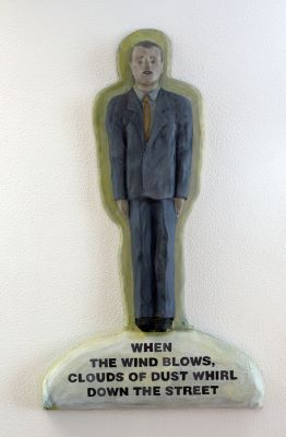 When the wind blows, clouds of dust whirl down the street