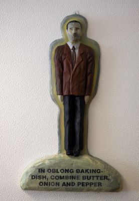 In oblong bakingdish combine butter, onion and pepper